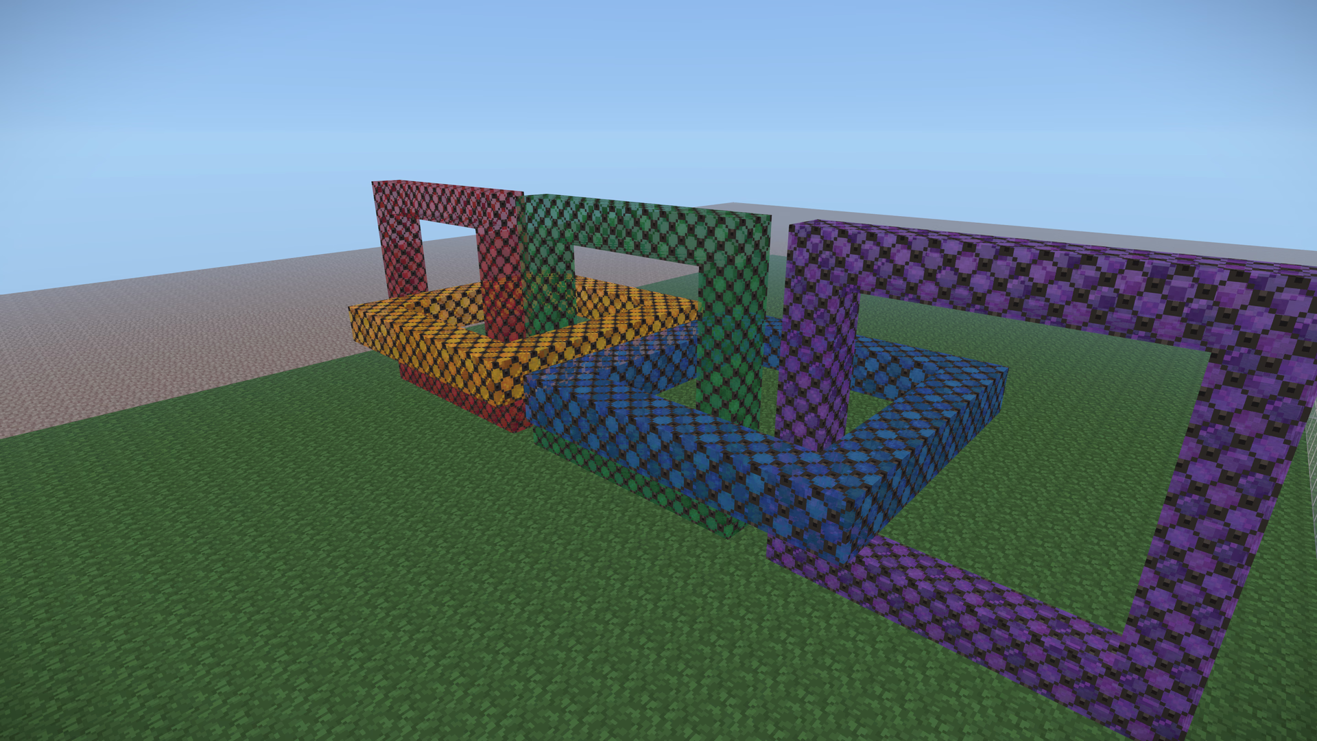 Five stained-glass links in red, amber, green, blue and violet, each threaded through the next